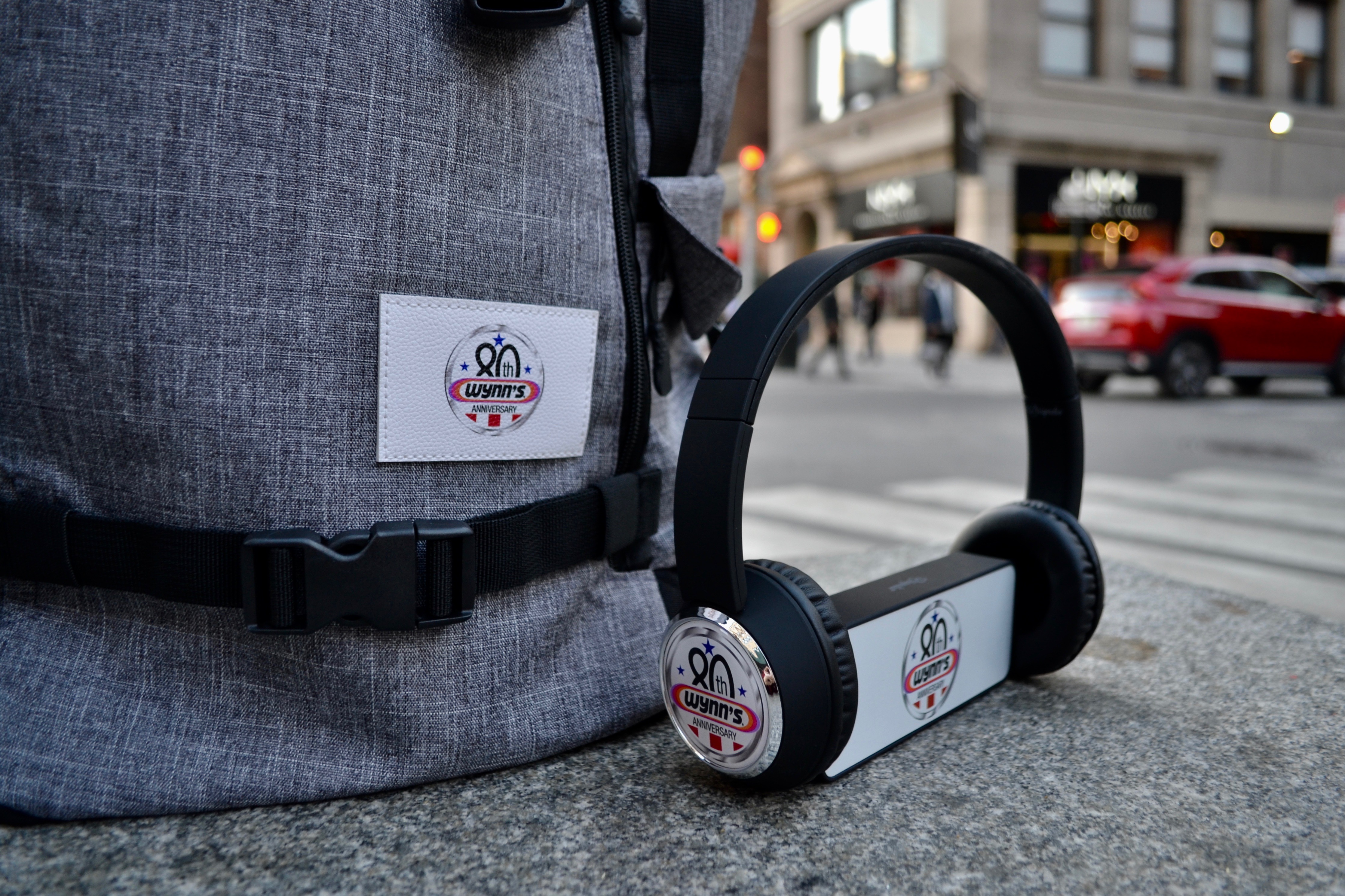 wynns 80th backpack headphones speaker logos